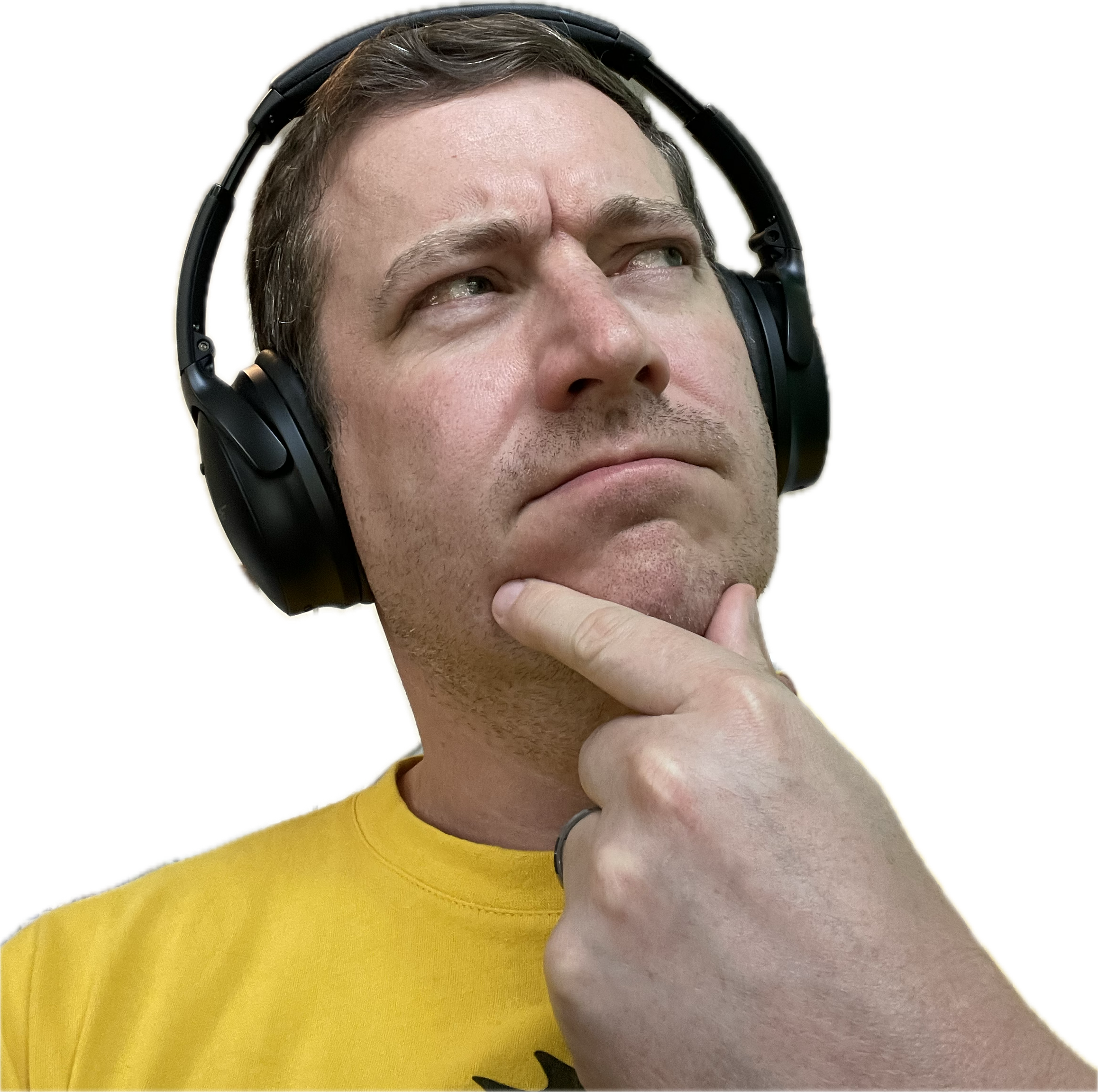 A man in a yellow shirt with a thinking expression